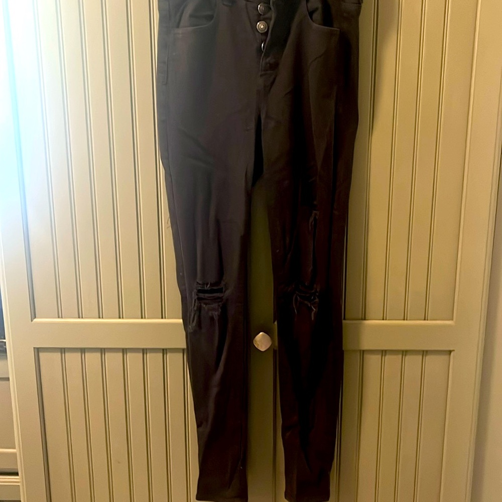 American Eagle size 4 R black stretch jeans with distressed knees button fly